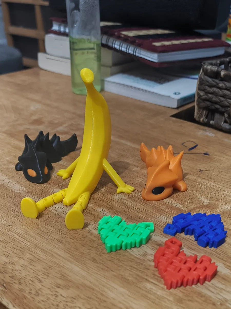 Colourful articulated 3D-printed figures and mechanisms made at Makerhood